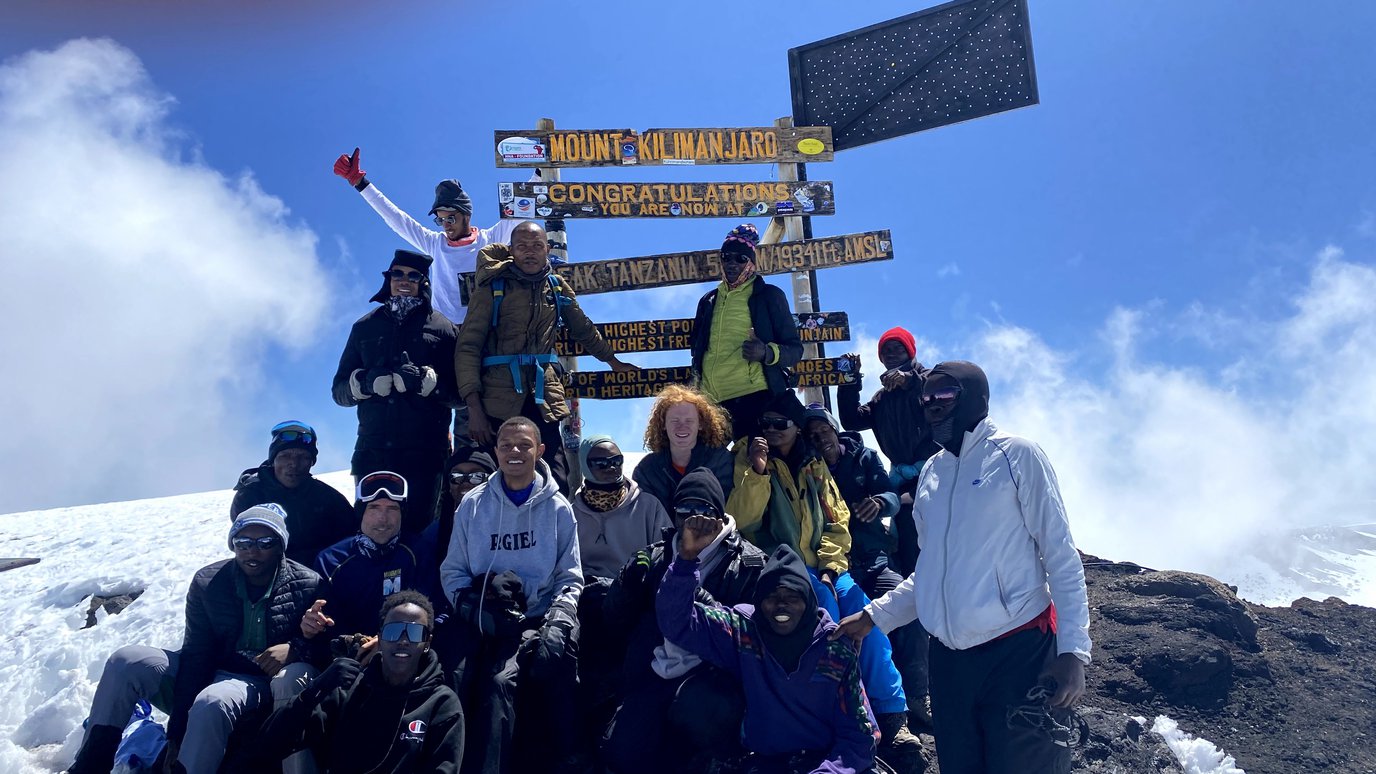 Uhuru peak with 9 BISA plus porters.jpg